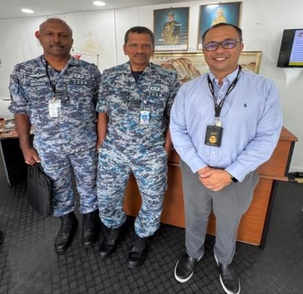 Curge Advance representative with Royal Malaysian Air Force (TUDM) officers