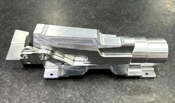 Precision-machined aerospace bracket component