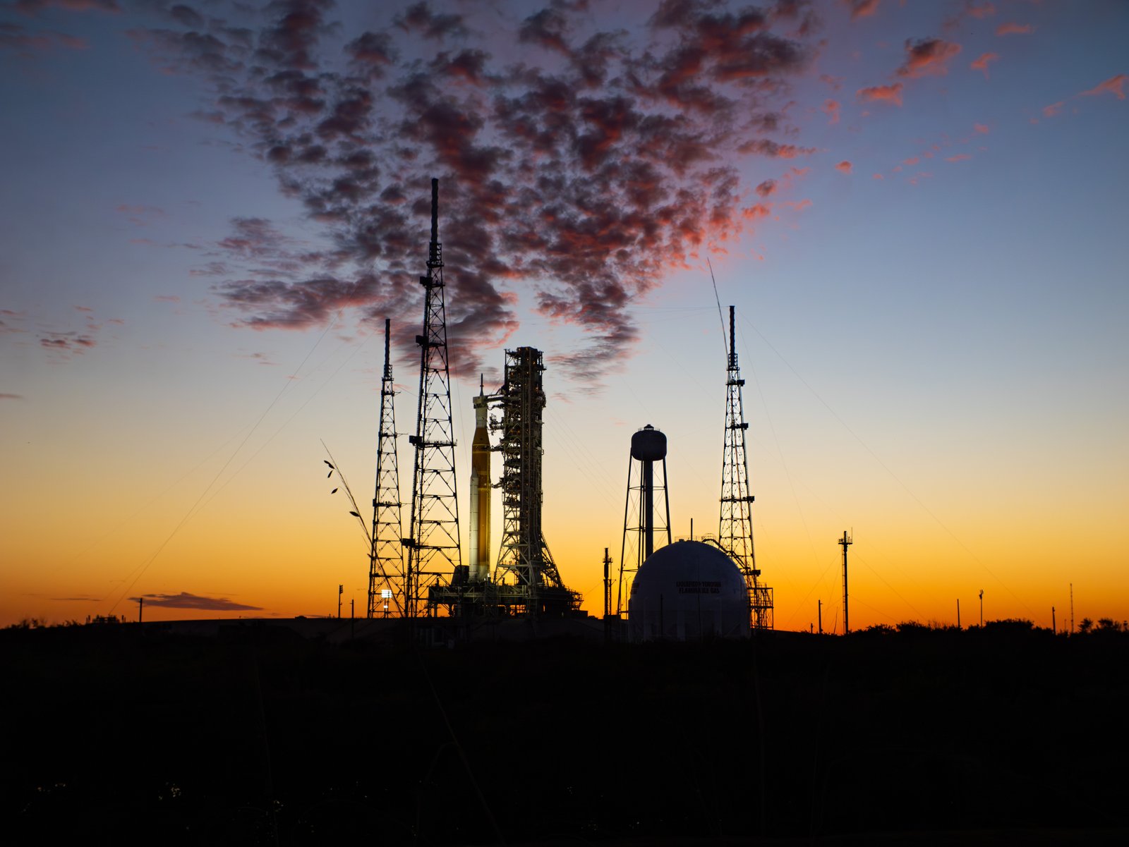 Rocket on the launch pad at sunset